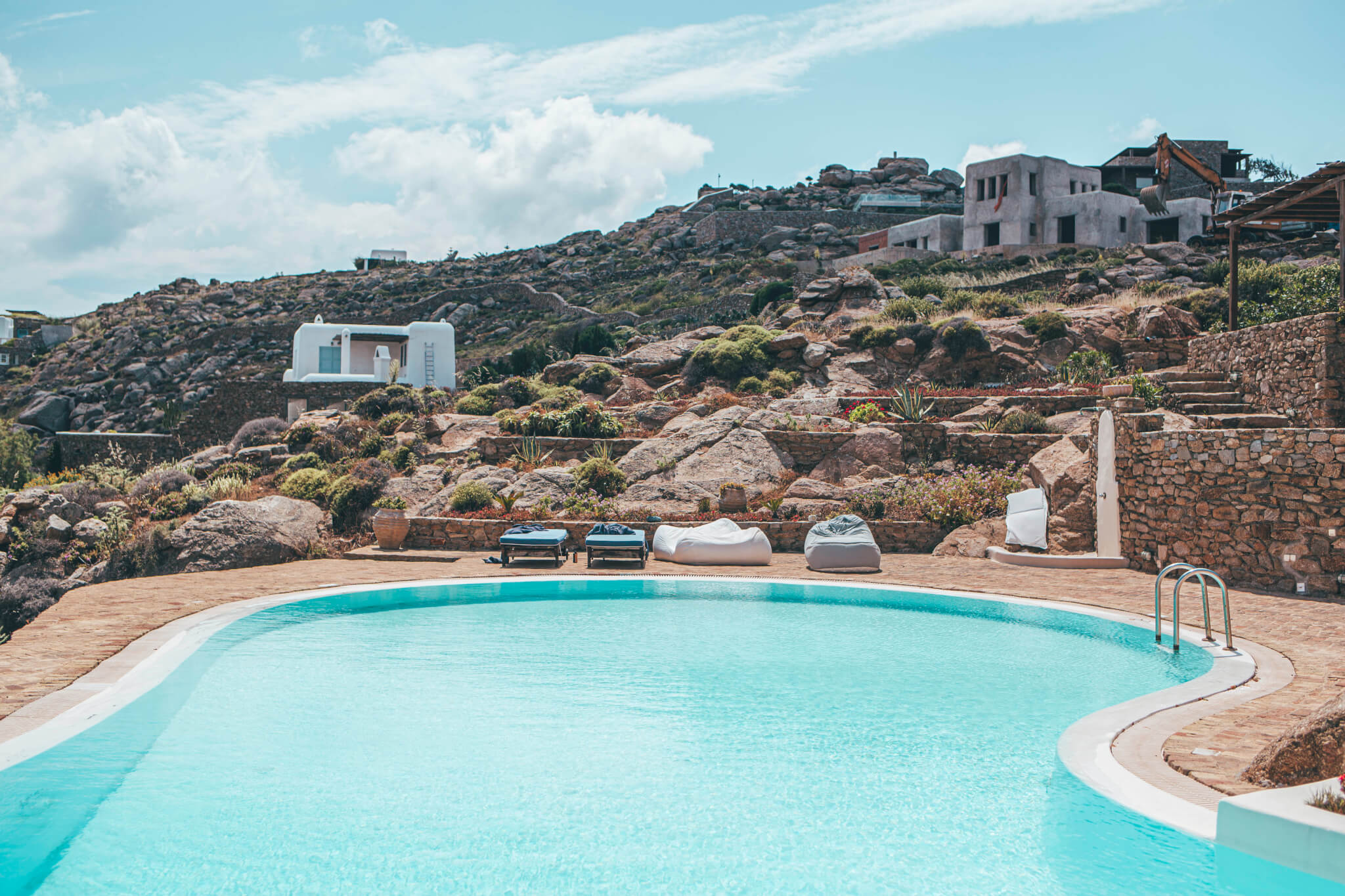 Mykonos luxury mixed with the cosmopolitan feel makes this island hard to miss when hopping around the Aegean Sea